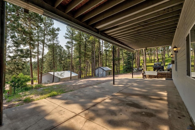 12525 Jax Ct, Rapid City, SD 57701 - view of patio / terrace featuring a storage unit