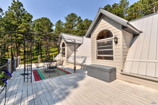 12525 Jax Ct, Rapid City, SD 57701 - wooden deck with outdoor dining space