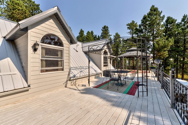 12525 Jax Ct, Rapid City, SD 57701 - deck with a gazebo and outdoor dining space