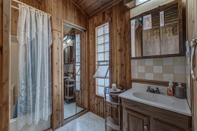 12525 Jax Ct, Rapid City, SD 57701 - full bathroom with vanity, wooden walls, shower / bath combo, and wooden ceiling