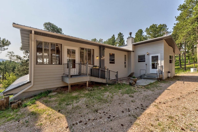 12525 Jax Ct, Rapid City, SD 57701 - view of front facade featuring a chimney