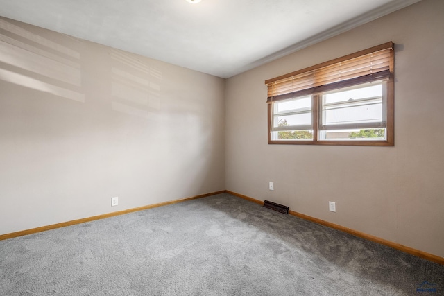 113 E Custer St, Rapid City, SD 57701 - empty room with carpet flooring and baseboards