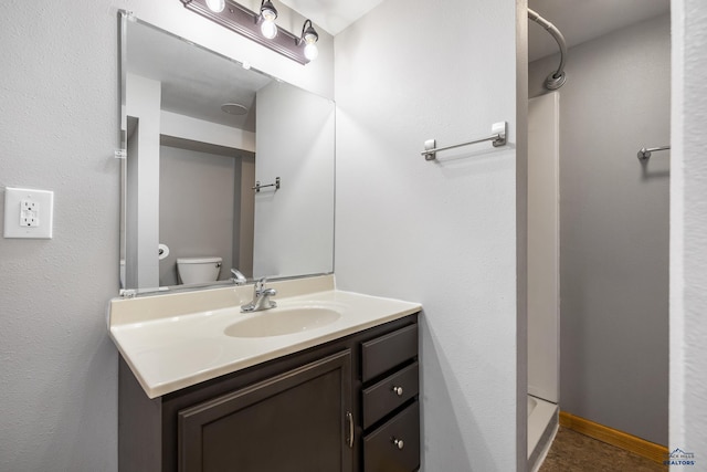 113 E Custer St, Rapid City, SD 57701 - bathroom with vanity and toilet