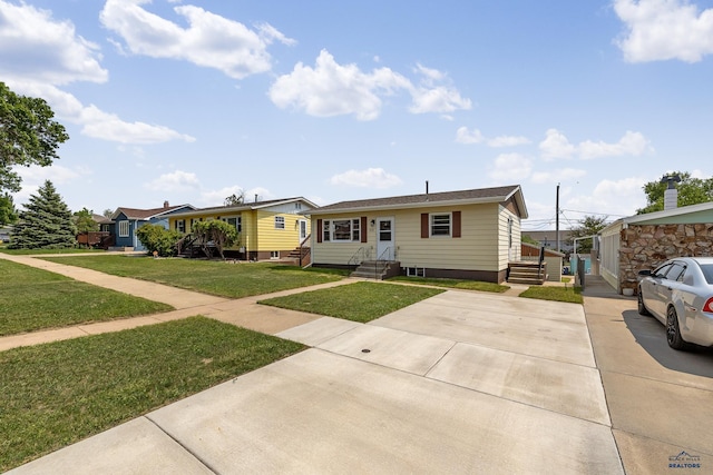 113 E Custer St, Rapid City, SD 57701 - view of front of house with entry steps and a front yard