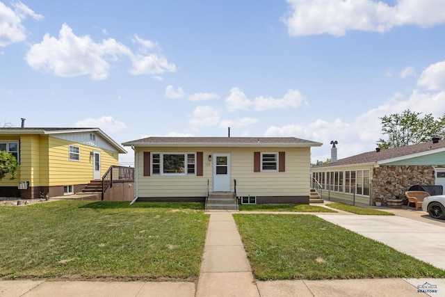 113 E Custer St, Rapid City, SD 57701 - view of front of house with a front lawn and entry steps
