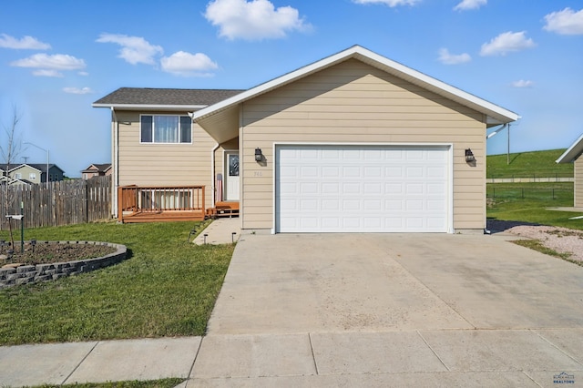 740 Bear Tooth Ct, Box Elder, SD 57719 - view of front of home featuring driveway and a garage