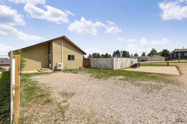 5400 Cedar Dr, Black Hawk, SD 57718 - view of home's exterior with gravel driveway and a cooling unit