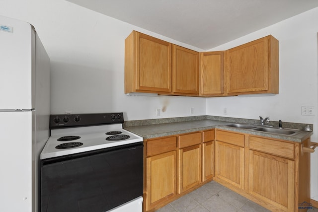 5400 Cedar Dr, Black Hawk, SD 57718 - kitchen with electric range oven, freestanding refrigerator, and light tile patterned flooring