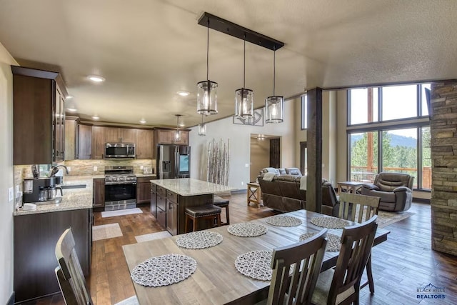 20746 Monte Carlo Rd, Lead, SD 57754 - dining room featuring dark wood-type flooring and recessed lighting