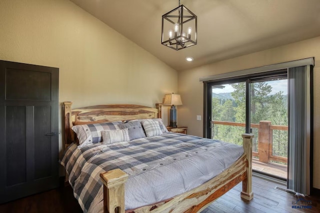 20746 Monte Carlo Rd, Lead, SD 57754 - bedroom with vaulted ceiling, access to outside, dark wood finished floors, and a chandelier