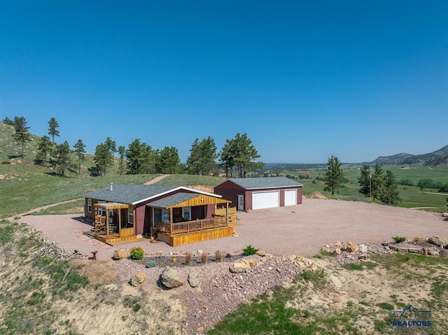 28085 Hargins Rd, Hot Springs, SD 57747 - view of front of property featuring a porch and a detached garage