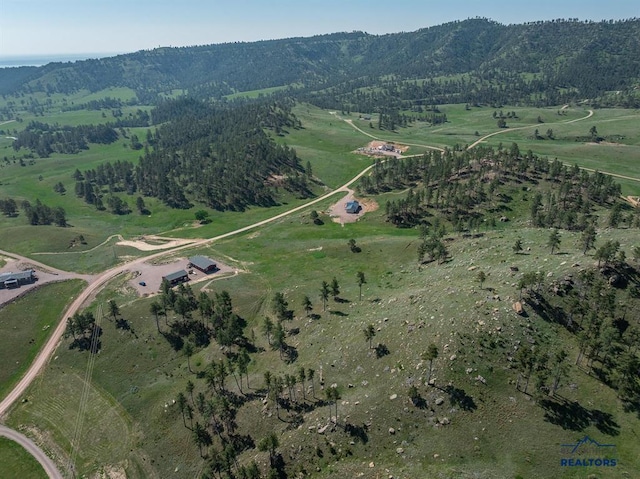 28085 Hargins Rd, Hot Springs, SD 57747 - aerial view of property and surrounding area with rural landscape and a mountainous background