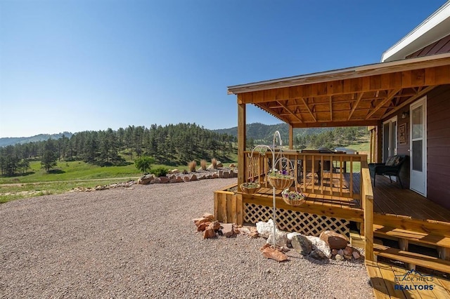 28085 Hargins Rd, Hot Springs, SD 57747 - wooden terrace featuring a mountain view