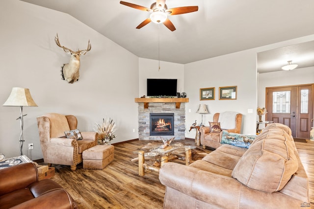 4519 Jolly Ln, Rapid City, SD 57701 - living area featuring ceiling fan, wood finished floors, lofted ceiling, and a fireplace