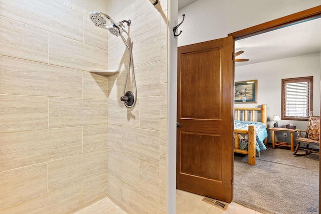 4519 Jolly Ln, Rapid City, SD 57701 - ensuite bathroom featuring tiled shower and a ceiling fan