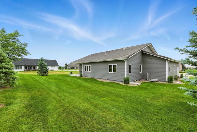 4519 Jolly Ln, Rapid City, SD 57701 - rear view of property with a lawn