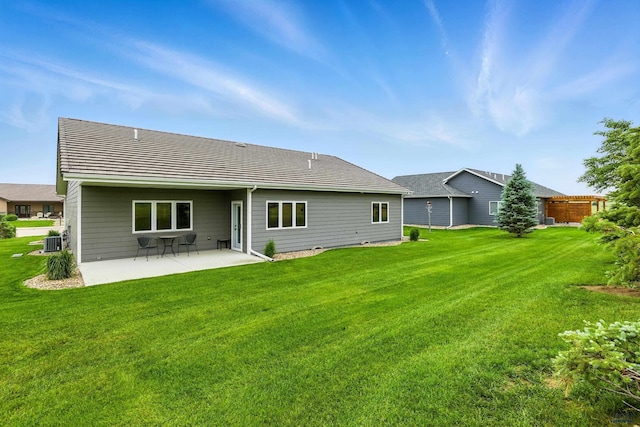 4519 Jolly Ln, Rapid City, SD 57701 - rear view of property featuring a patio and a yard