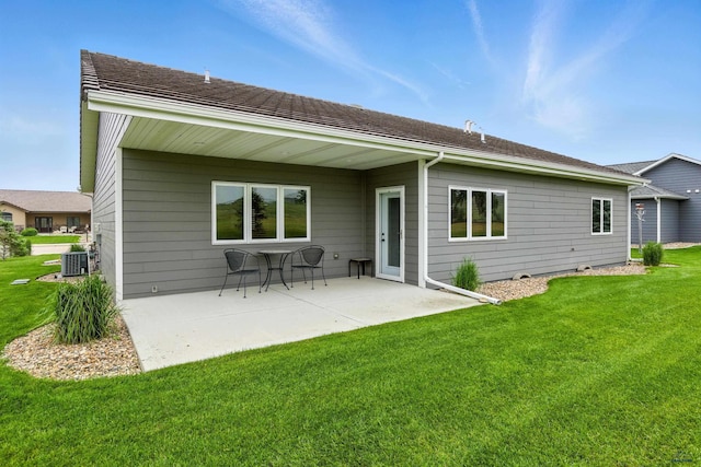 4519 Jolly Ln, Rapid City, SD 57701 - back of property with a patio area and a yard