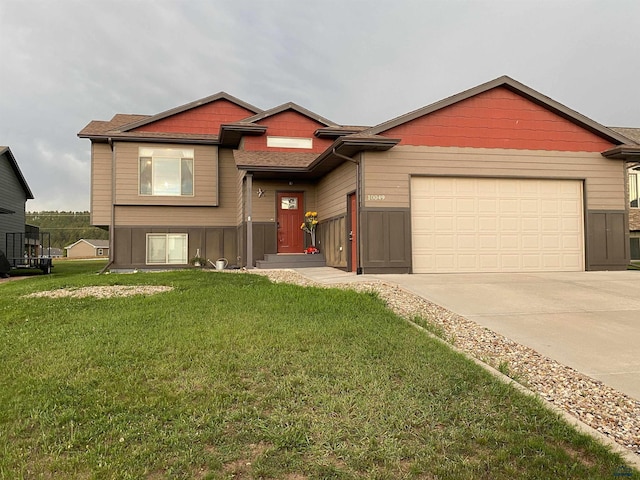 10049 Kaelem Ct, Summerset, SD 57718 - view of front of property with a garage, driveway, and a front yard