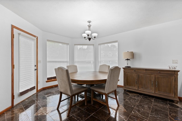 6401 Mountain Meadow Rd, Black Hawk, SD 57718 - dining space with a chandelier and baseboards
