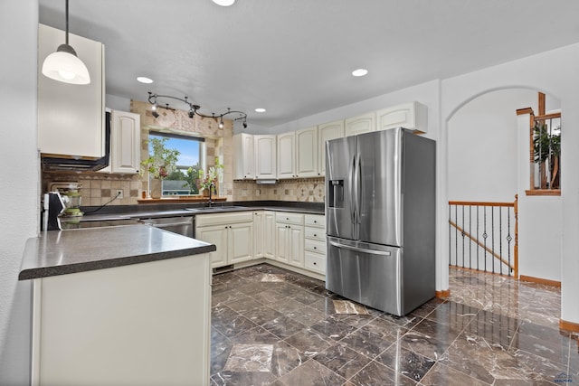 6401 Mountain Meadow Rd, Black Hawk, SD 57718 - kitchen with stainless steel refrigerator with ice dispenser, dark marble finish flooring, dark countertops, decorative backsplash, and recessed lighting