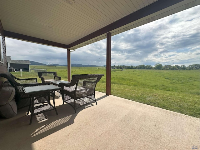 215 Aurora Ave, Spearfish, SD 57783 - view of patio featuring a view of countryside