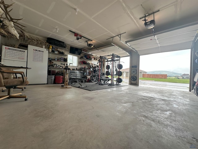 215 Aurora Ave, Spearfish, SD 57783 - garage featuring a garage door opener