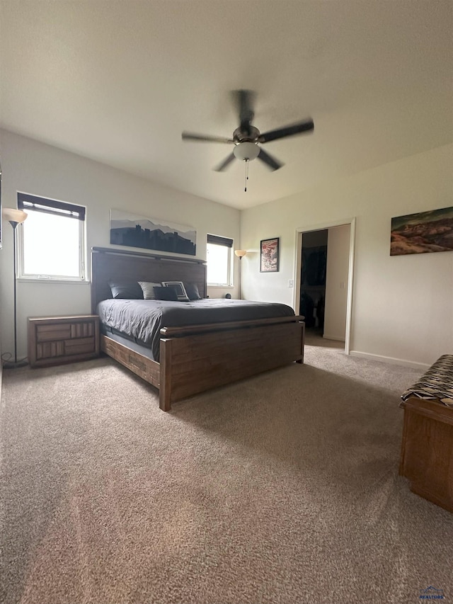 215 Aurora Ave, Spearfish, SD 57783 - carpeted bedroom with ceiling fan and baseboards