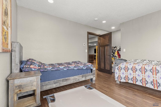 5642 Bob Ln, Black Hawk, SD 57718 - bedroom featuring wood finished floors and recessed lighting