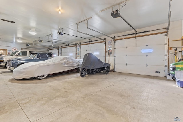5642 Bob Ln, Black Hawk, SD 57718 - garage featuring a garage door opener