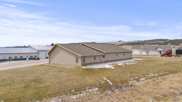 5642 Bob Ln, Black Hawk, SD 57718 - view of side of property featuring concrete driveway
