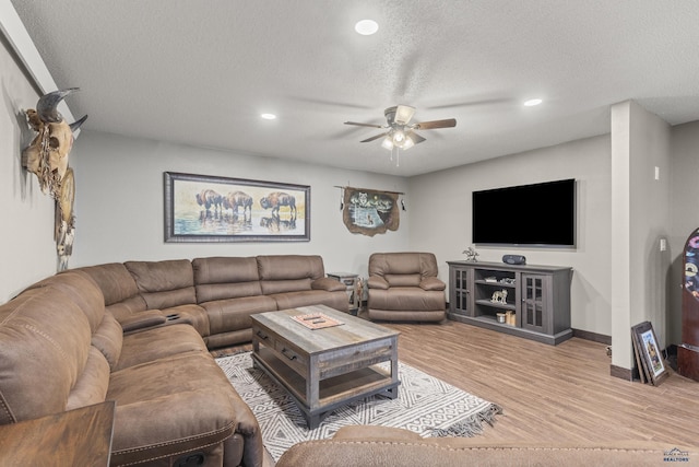5642 Bob Ln, Black Hawk, SD 57718 - living room featuring ceiling fan, wood finished floors, a textured ceiling, and recessed lighting