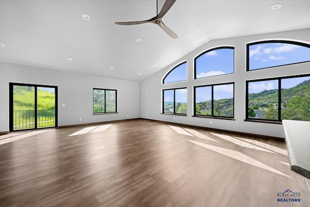 231 Powderhorn Unit 231Powderhorn, Court, Spearfish, SD 57783 - unfurnished living room with ceiling fan, wood finished floors, high vaulted ceiling, and recessed lighting