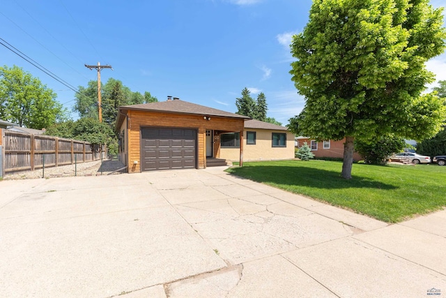 4340 Timothy, Rapid City, SD 57702 - ranch-style home with a garage and concrete driveway