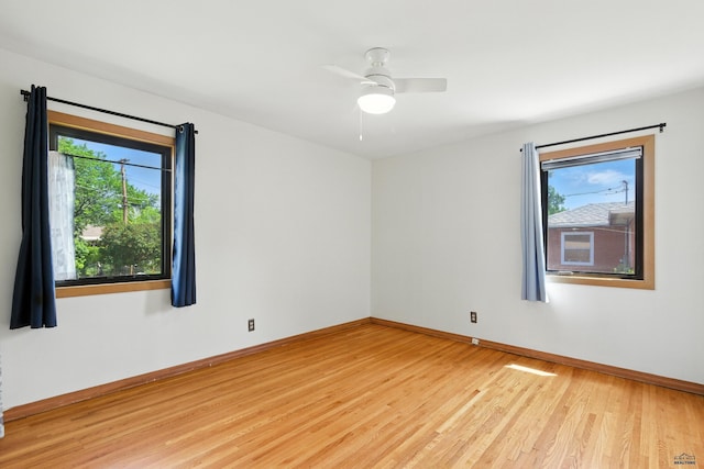 4340 Timothy, Rapid City, SD 57702 - spare room featuring plenty of natural light, light wood-type flooring, and a ceiling fan
