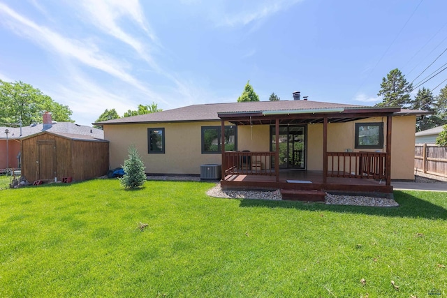 4340 Timothy, Rapid City, SD 57702 - back of house with a storage unit and stucco siding