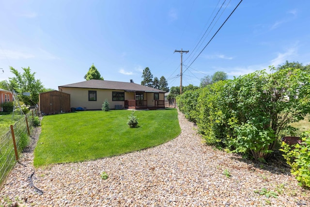 4340 Timothy, Rapid City, SD 57702 - rear view of house featuring a storage unit and covered porch