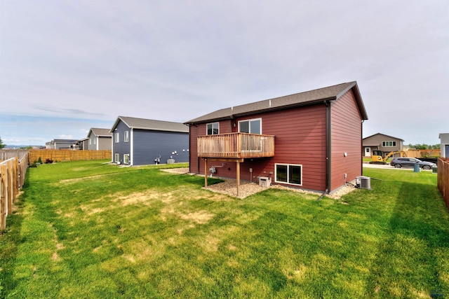613 Civil Way, Box Elder, SD 57719 - rear view of property with a fenced backyard and a deck