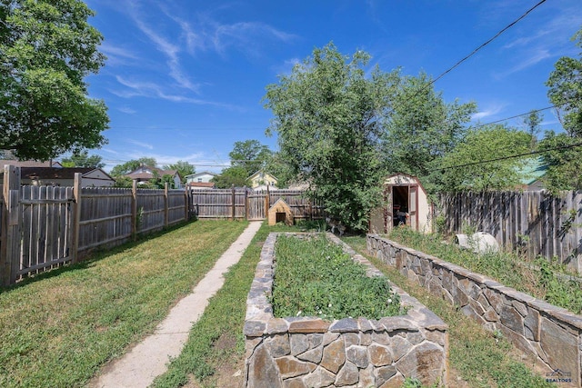 911 Haines Ave, Rapid City, SD 57701 - fenced backyard featuring a storage shed