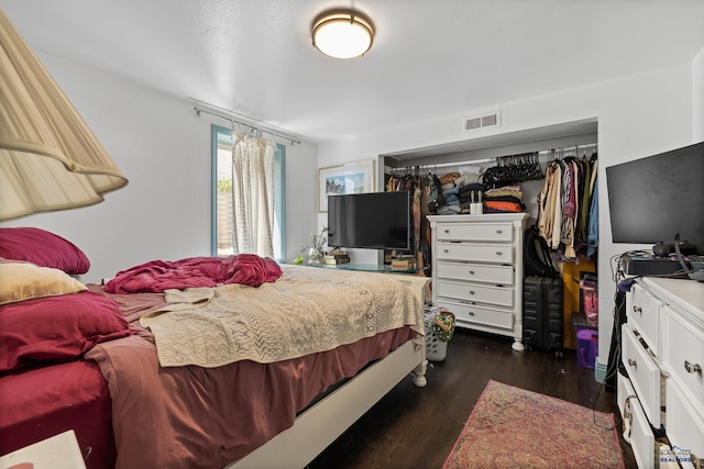 911 Haines Ave, Rapid City, SD 57701 - bedroom featuring a closet and dark wood-type flooring