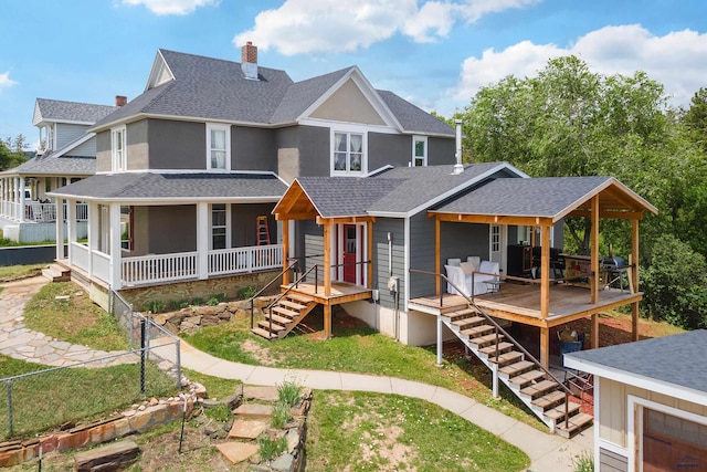 1820 Summit, Hot Spring, SD 57747 - view of front of property featuring stairs, roof with shingles, a chimney, and a porch