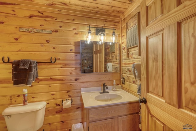 20813 Legends Ln, Sturgis, SD 57785 - half bath featuring vanity and wood walls