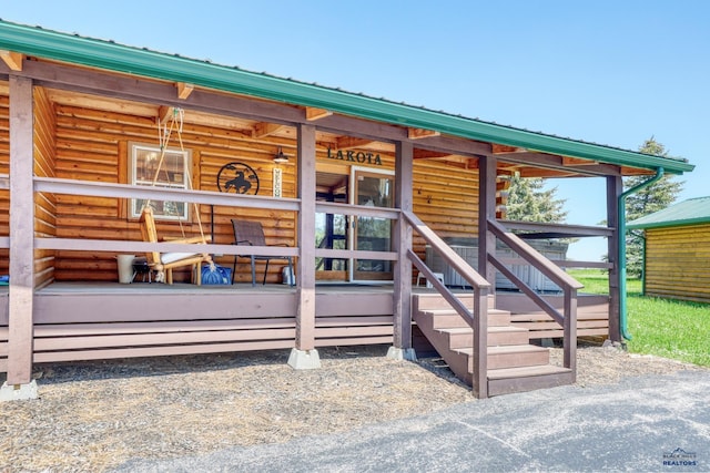 20813 Legends Ln, Sturgis, SD 57785 - doorway to property with a metal roof