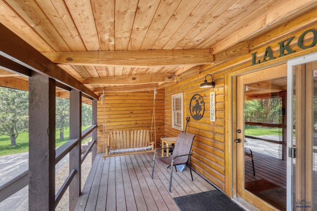 20813 Legends Ln, Sturgis, SD 57785 - unfurnished sunroom featuring plenty of natural light and beamed ceiling