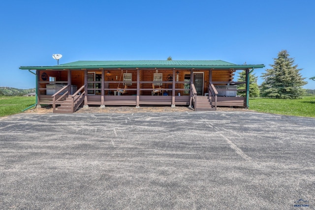 20813 Legends Ln, Sturgis, SD 57785 - view of front of home featuring log siding