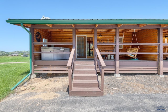 20813 Legends Ln, Sturgis, SD 57785 - view of exterior entry with a metal roof