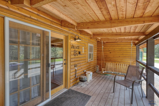 20813 Legends Ln, Sturgis, SD 57785 - unfurnished sunroom featuring beam ceiling