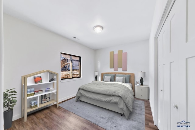 3226 W Rapid, Rapid City, SD 57702 - bedroom with wood finished floors and baseboards