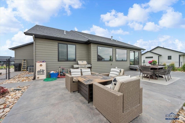 2147 Talisker Ave, Spearfish, SD 57783 - back of property featuring outdoor dining space, a patio, and exterior kitchen