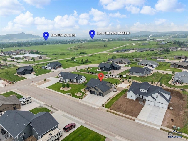 2147 Talisker Ave, Spearfish, SD 57783 - aerial perspective of suburban area featuring a mountainous background